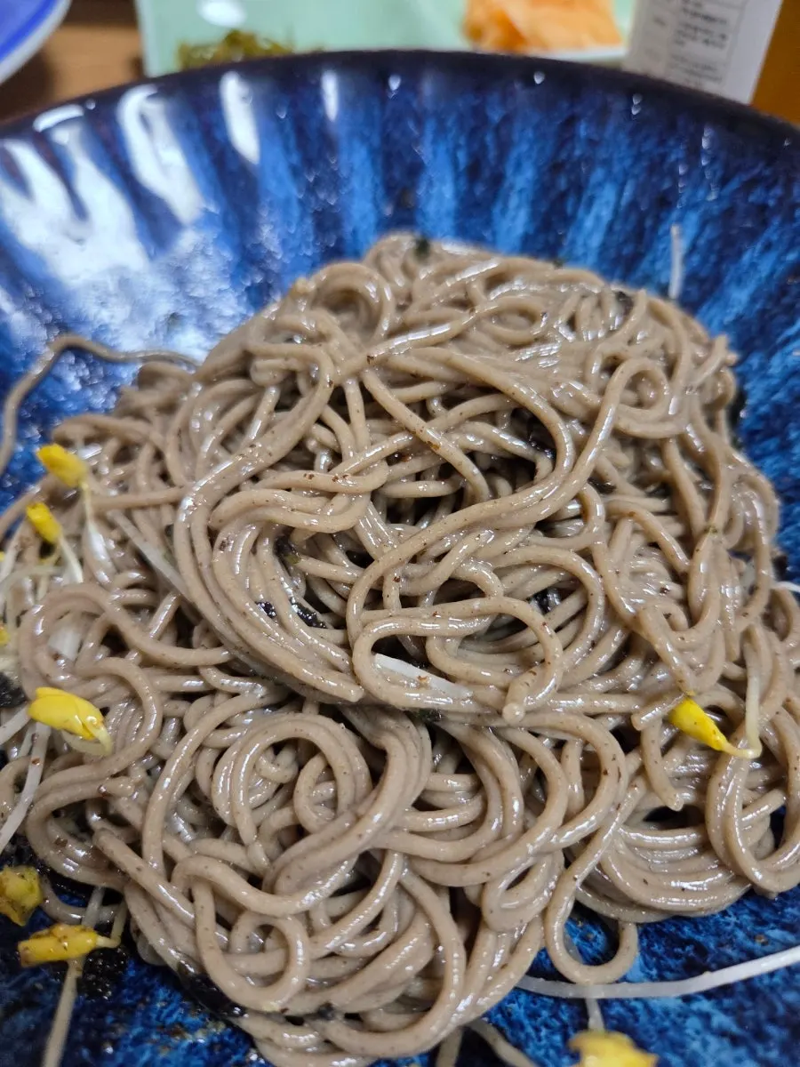 Buckwheat migamyeon topped generously with ground perilla seeds