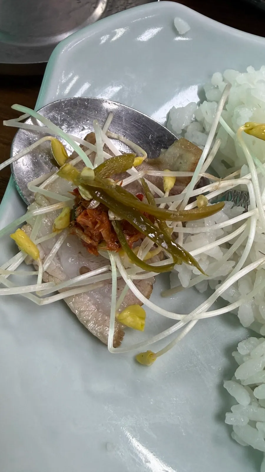 Wrapping pork and side dishes in a buckwheat sprout