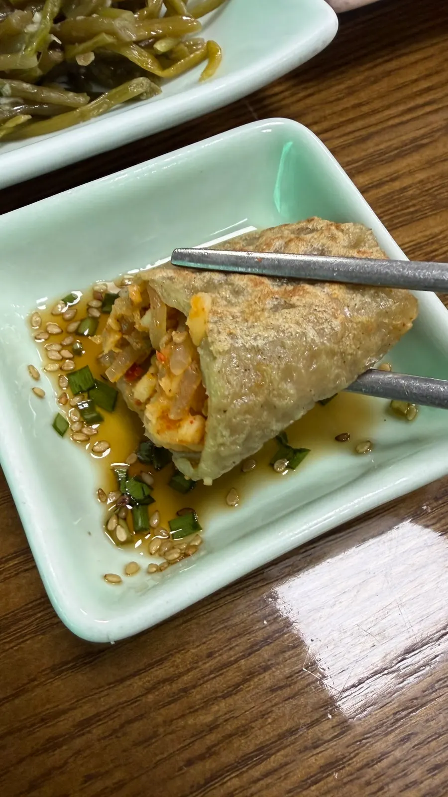 Cross-section of buckwheat pancake showing the filling