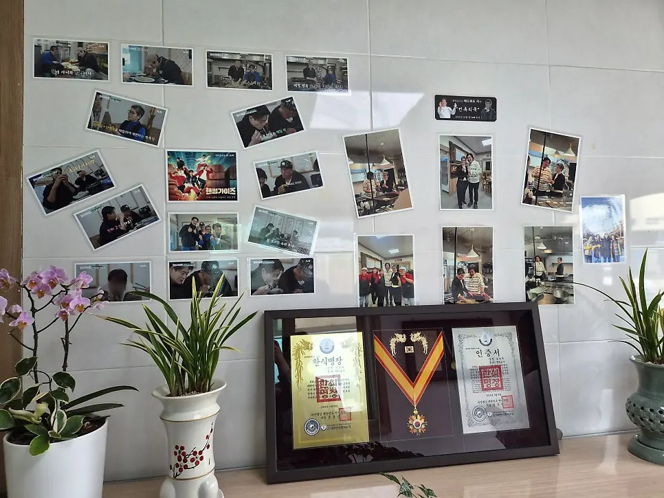 Master craftsman certification displayed inside Bongpyeong Memil Migayeon