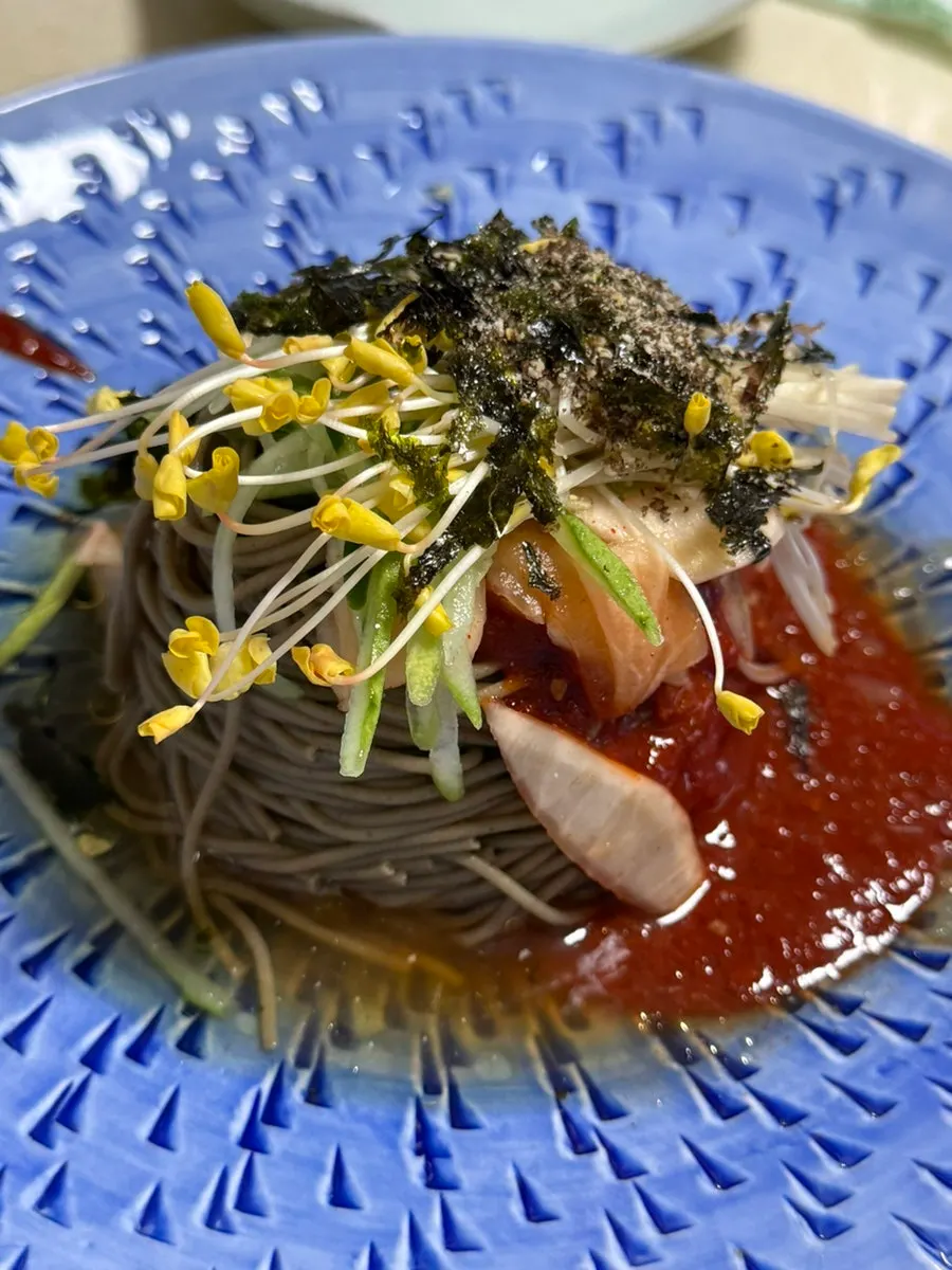 Yukhoe bibimbap served with wrap vegetables
