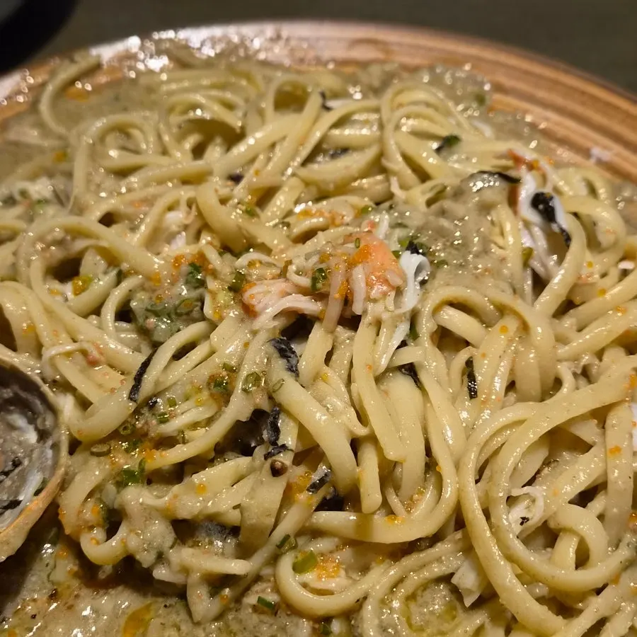 Pasta mixed with crab meat and flying-fish roe