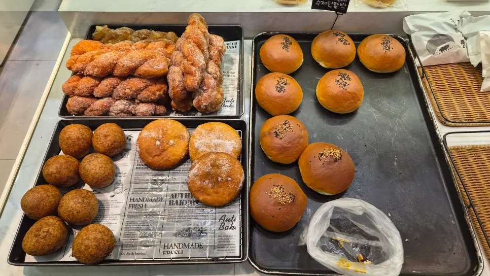 Freshly baked breads on display at Milbat Bakery Pyeongchon