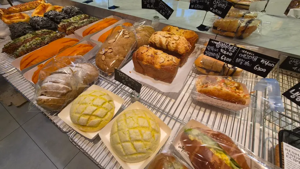 Variety of breads on display at Milbat Bakery Pyeongchon