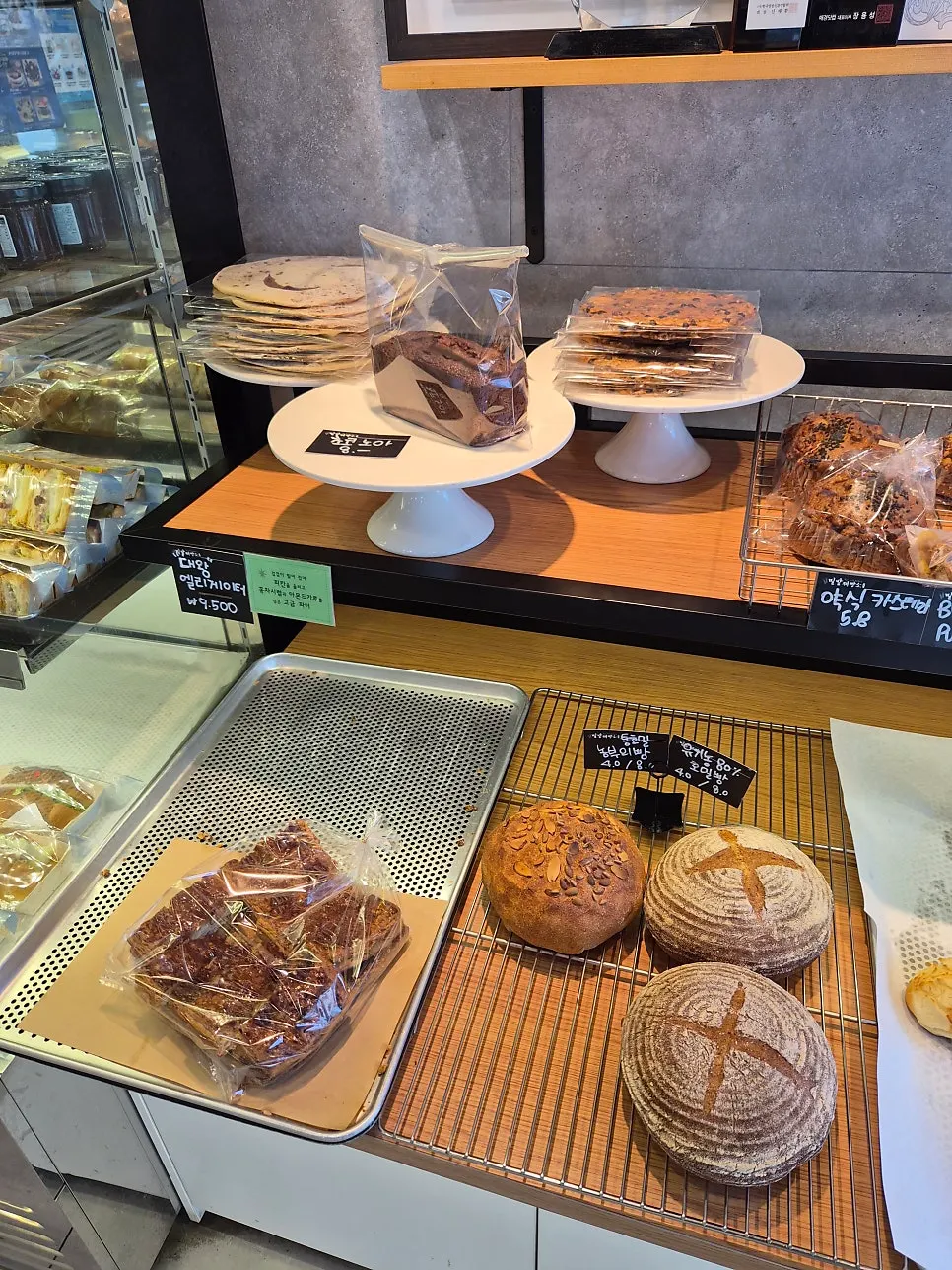 Various breads laid out on the counter