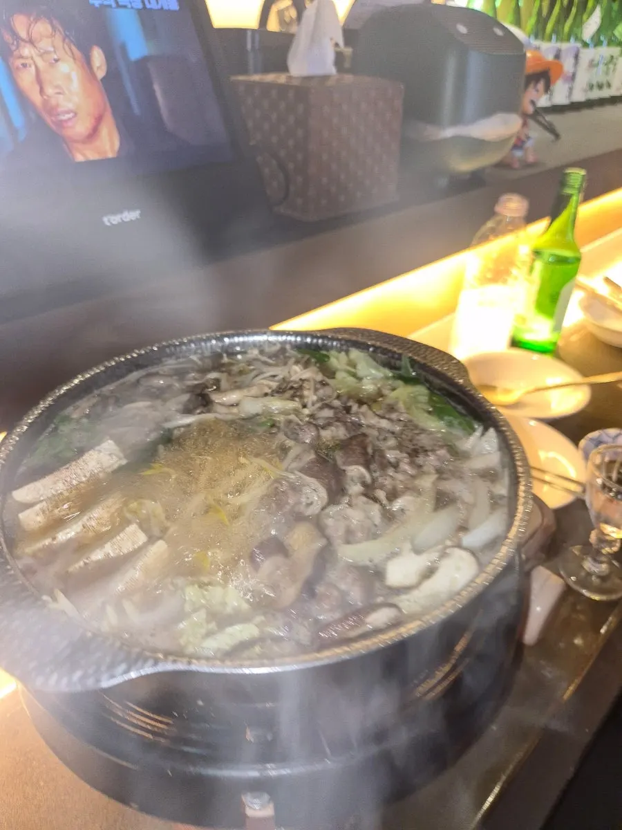 Sukiyaki meat dipped in egg yolk sauce
