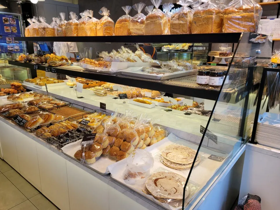 Various breads arranged on the shelf