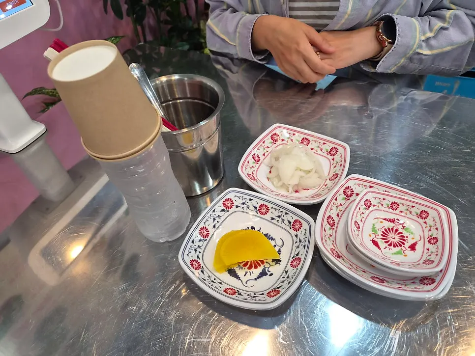 Pink-accented interior of Pho Witch