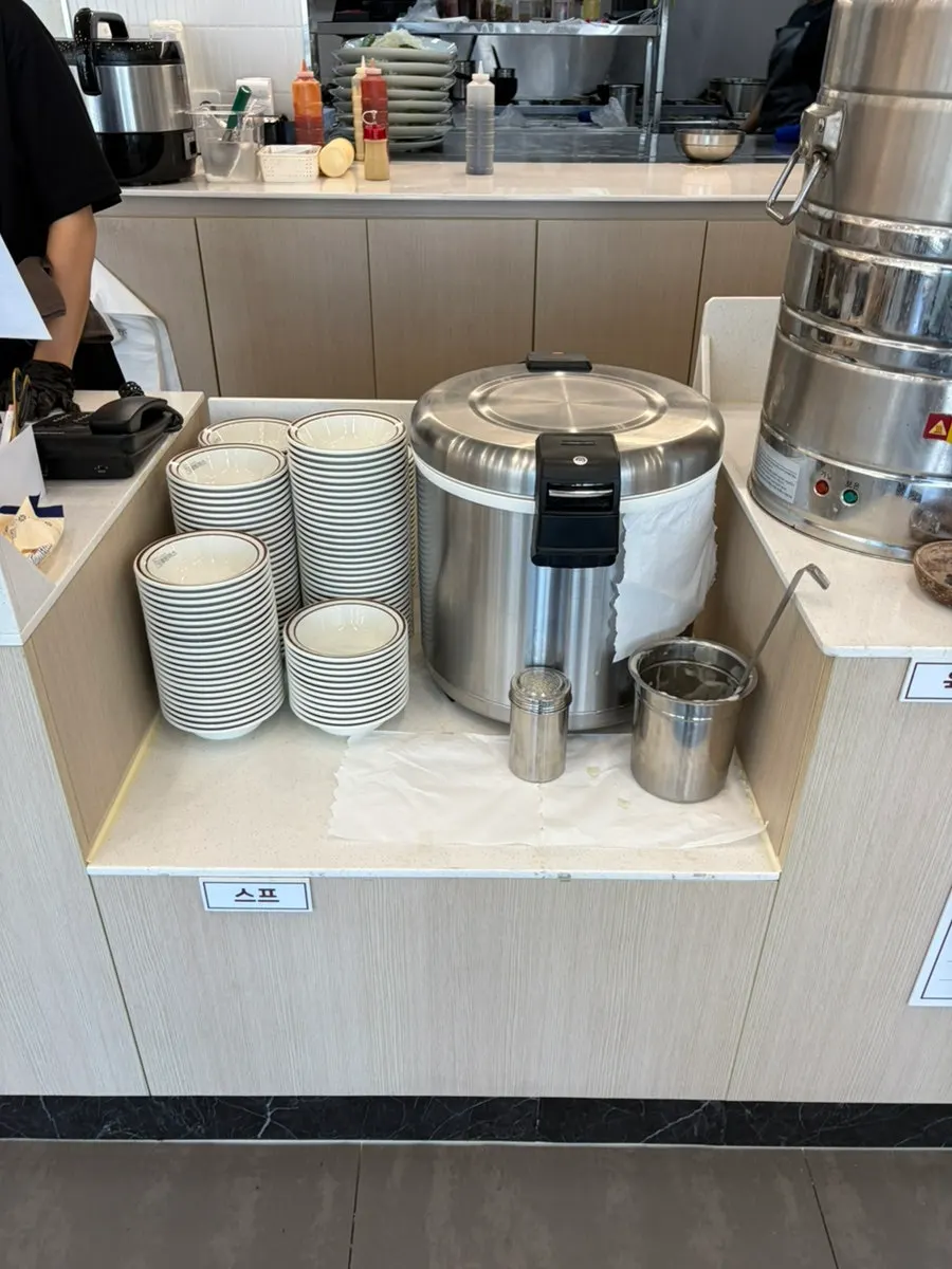 Self-serve bar corner with tableware
