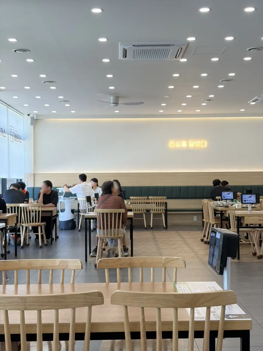 Soup from the self-serve bar with table setting