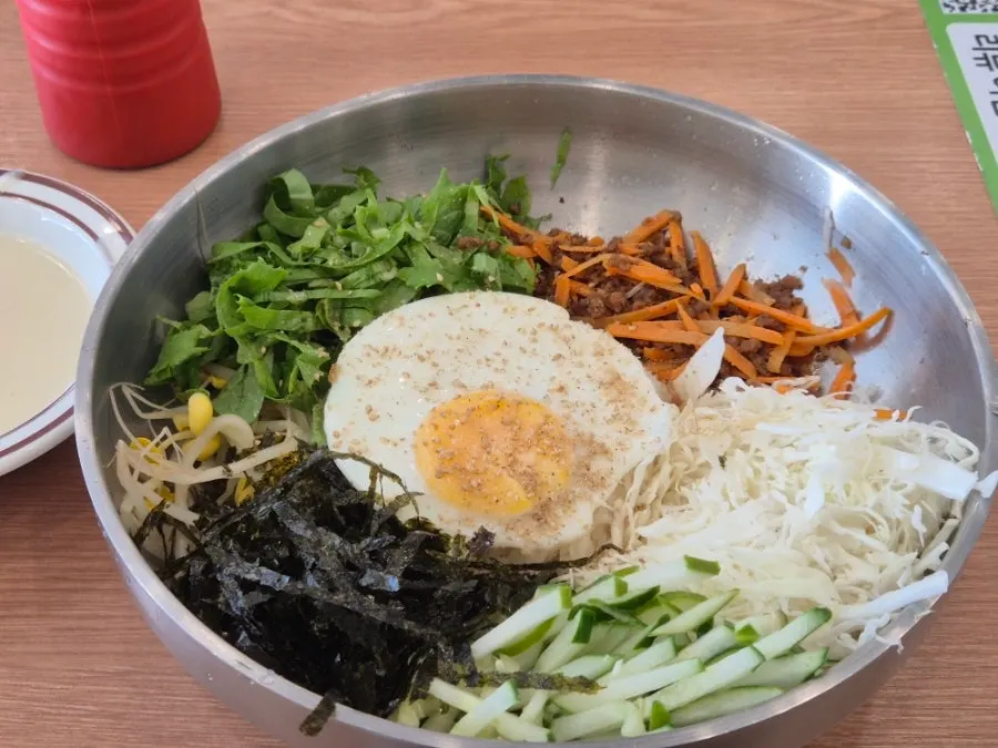 Table set with bibimbap and cold soba together