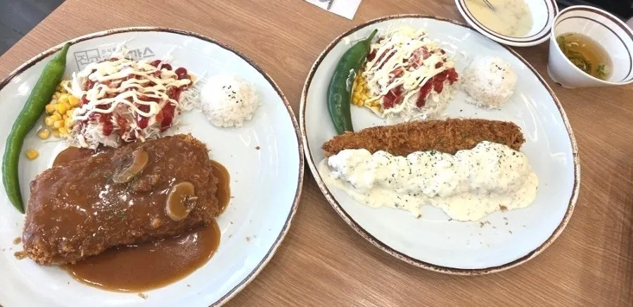A spread of cheese waterfall donkatsu and Jinsim fish cutlet