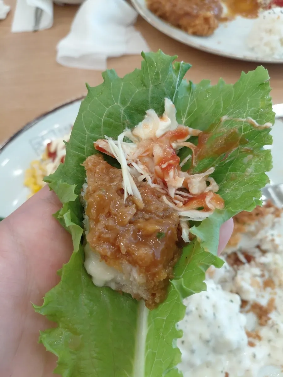 Wrapping donkatsu in a vegetable leaf