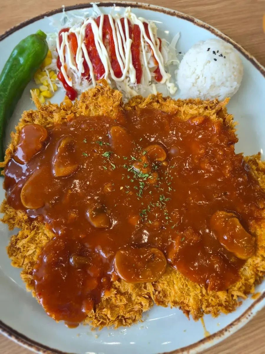 Cross-section of the sliced spicy donkatsu