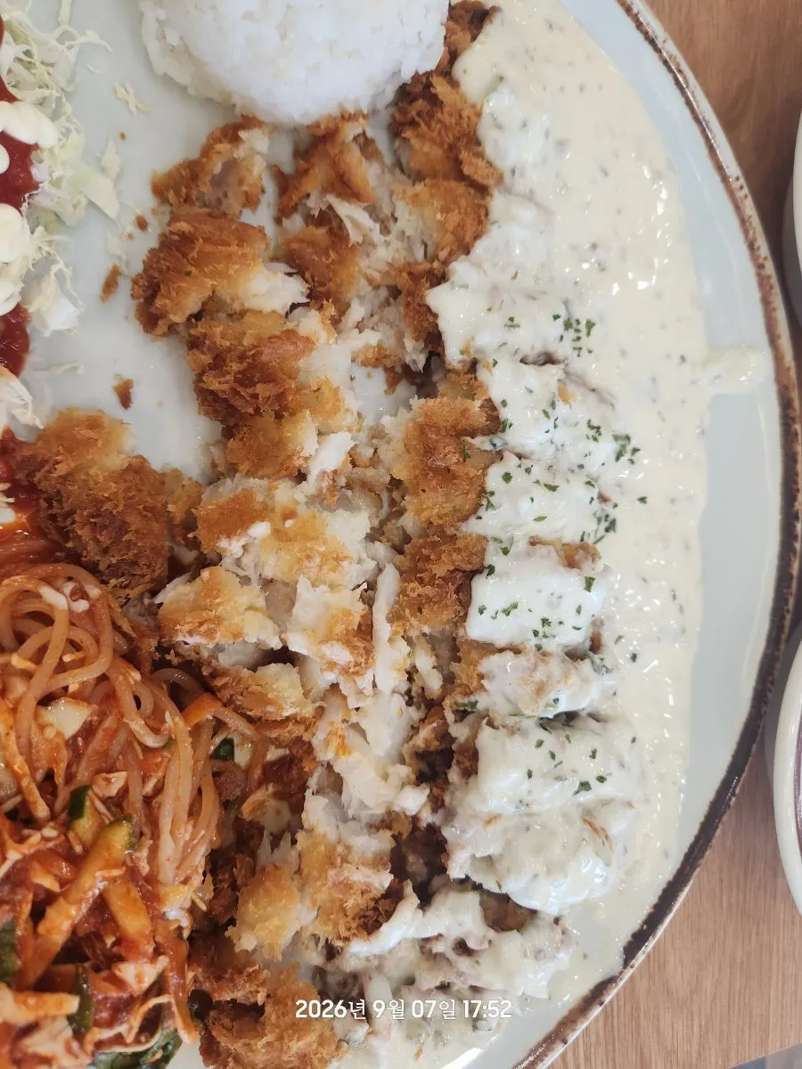 Close-up of jjol fish cutlet served with jjolmyeon
