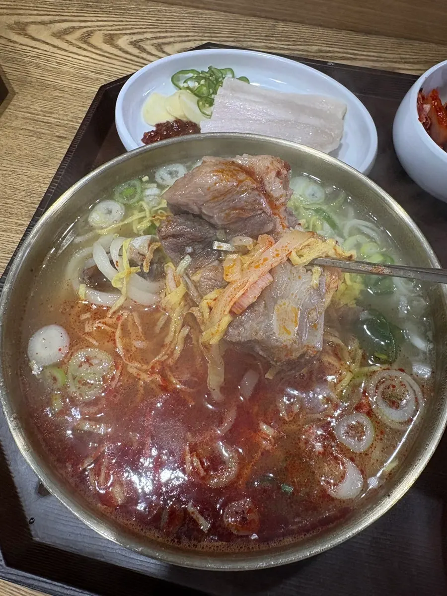 Bone meat picked apart with chopsticks