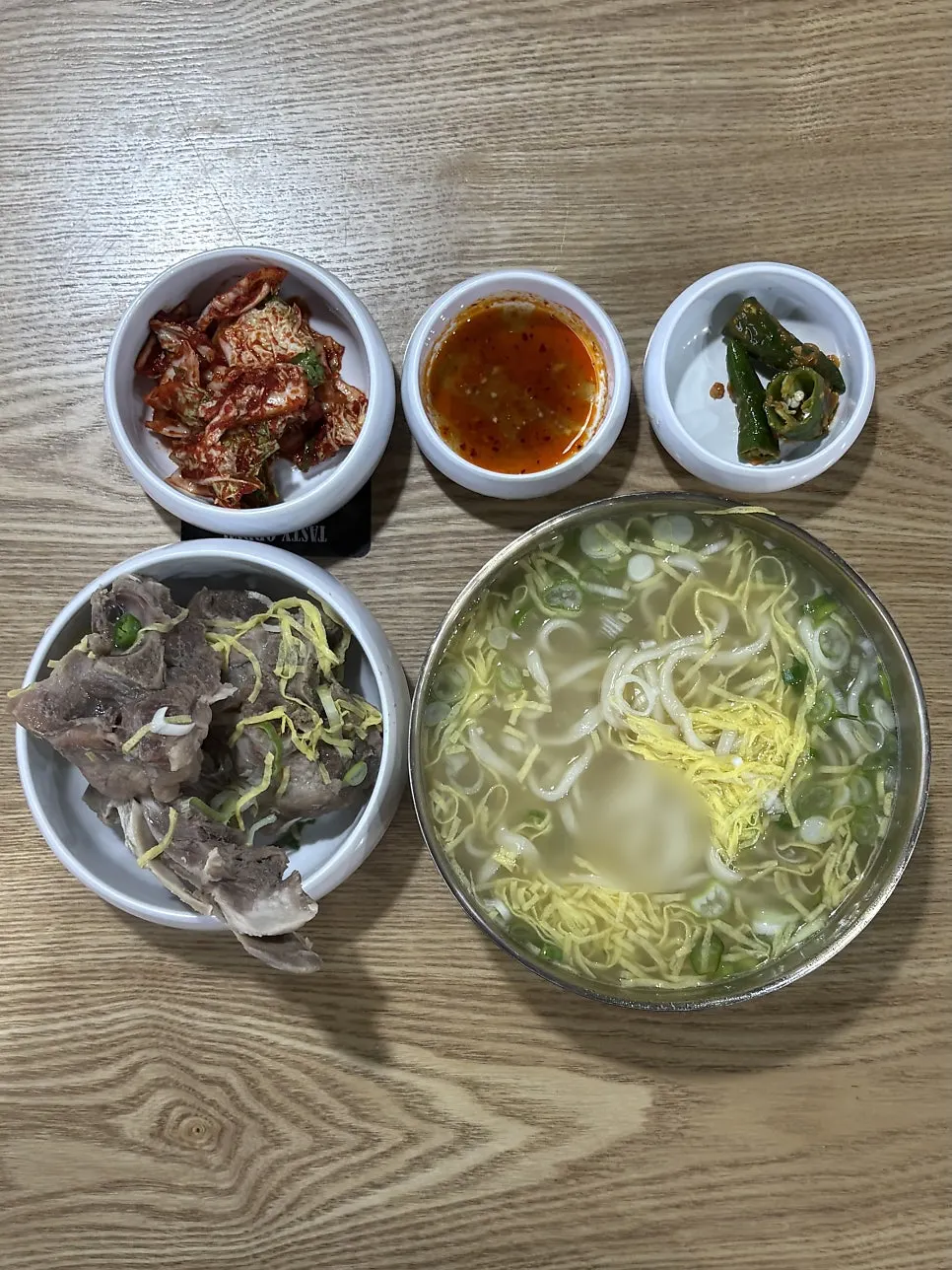 Bone kalguksu set on a Taste Village table