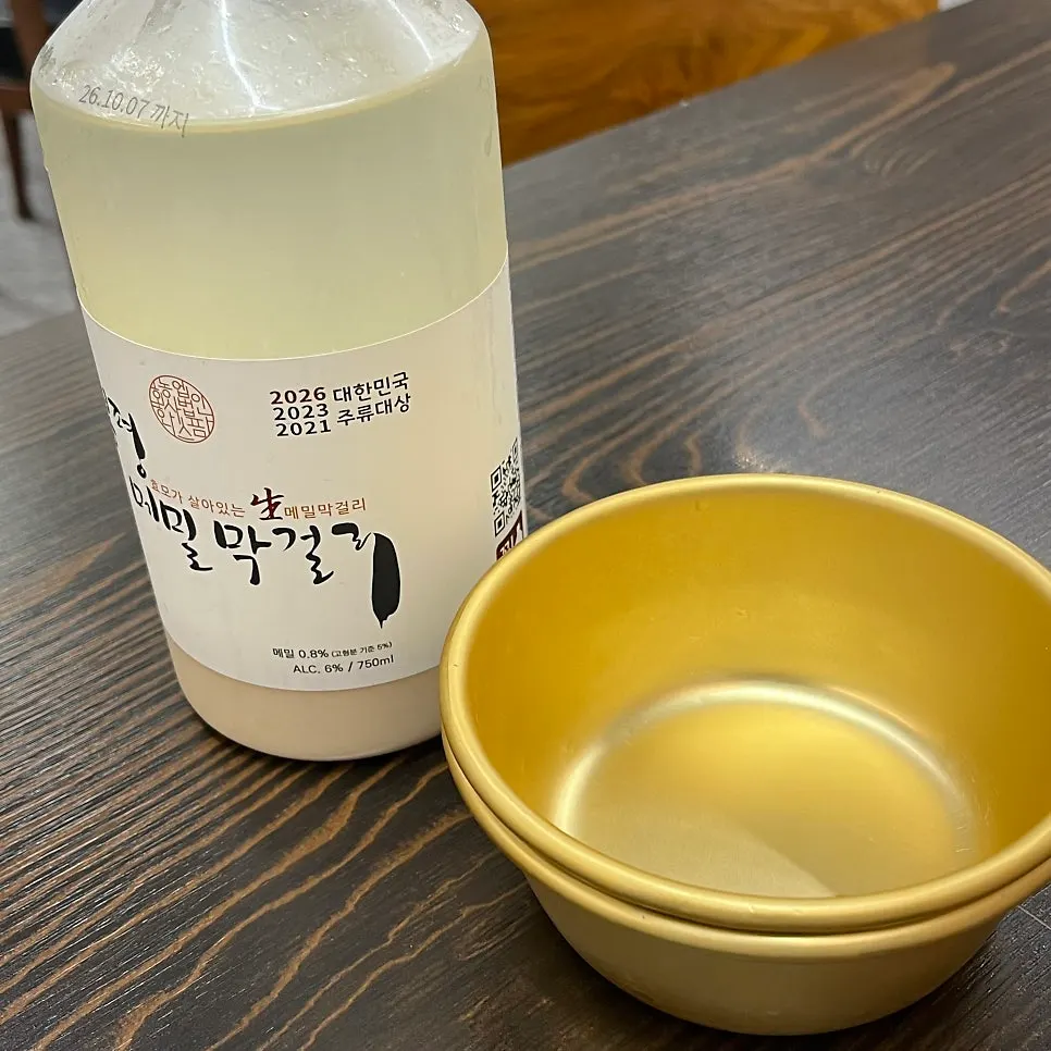 Bongpyeong buckwheat makgeolli poured into a glass