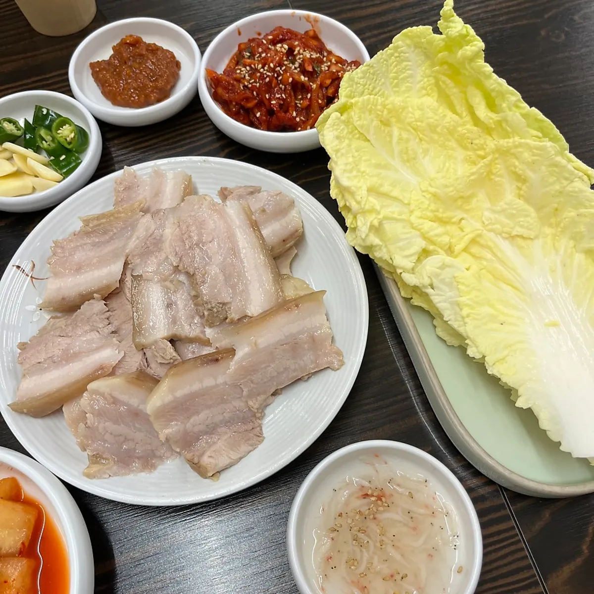 Basic side dishes of napa cabbage kimchi and cubed radish kimchi