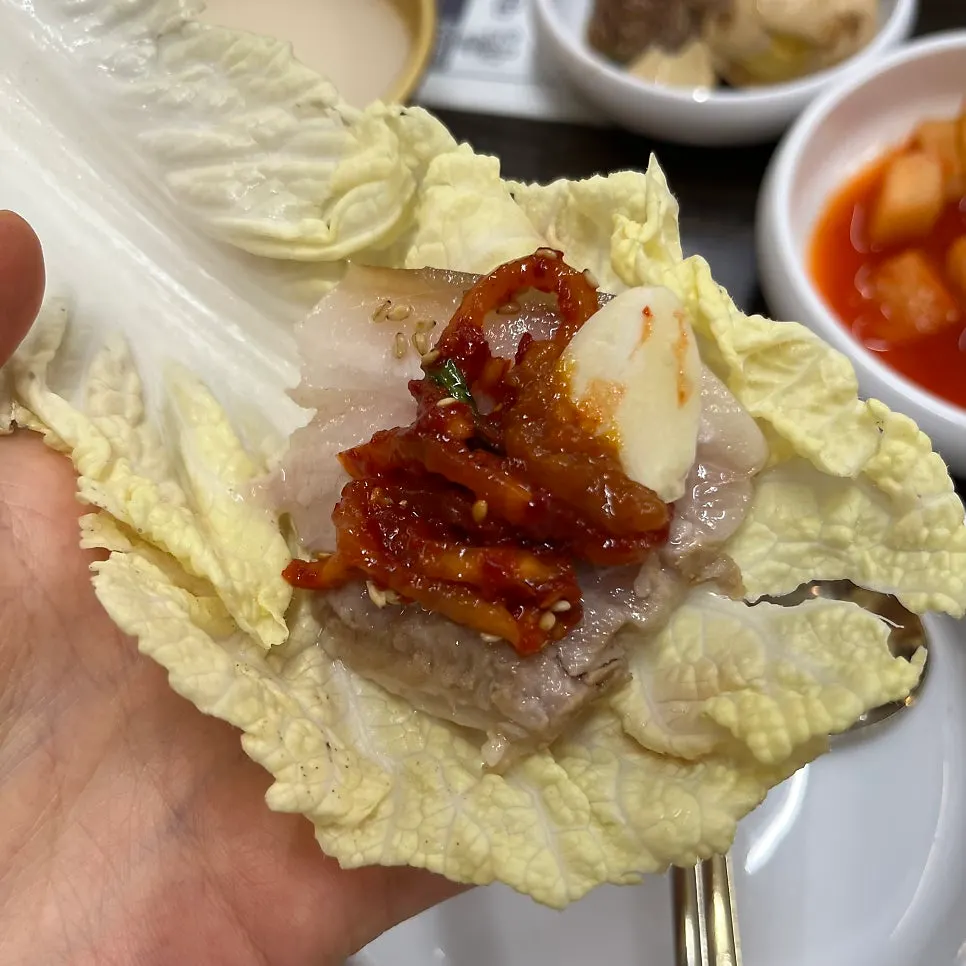 Full bossam spread of pork belly with dried radish and salted shrimp