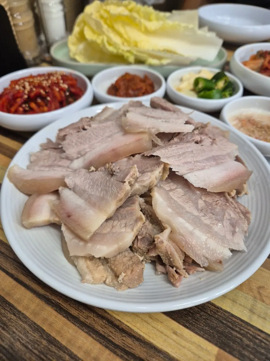 A glass of Bongpyeong buckwheat raw makgeolli