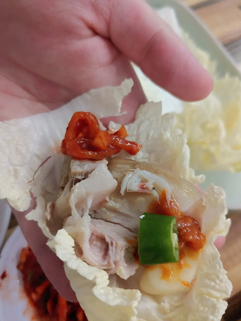 The bossam, cabbage wrap, and radish kimchi combo