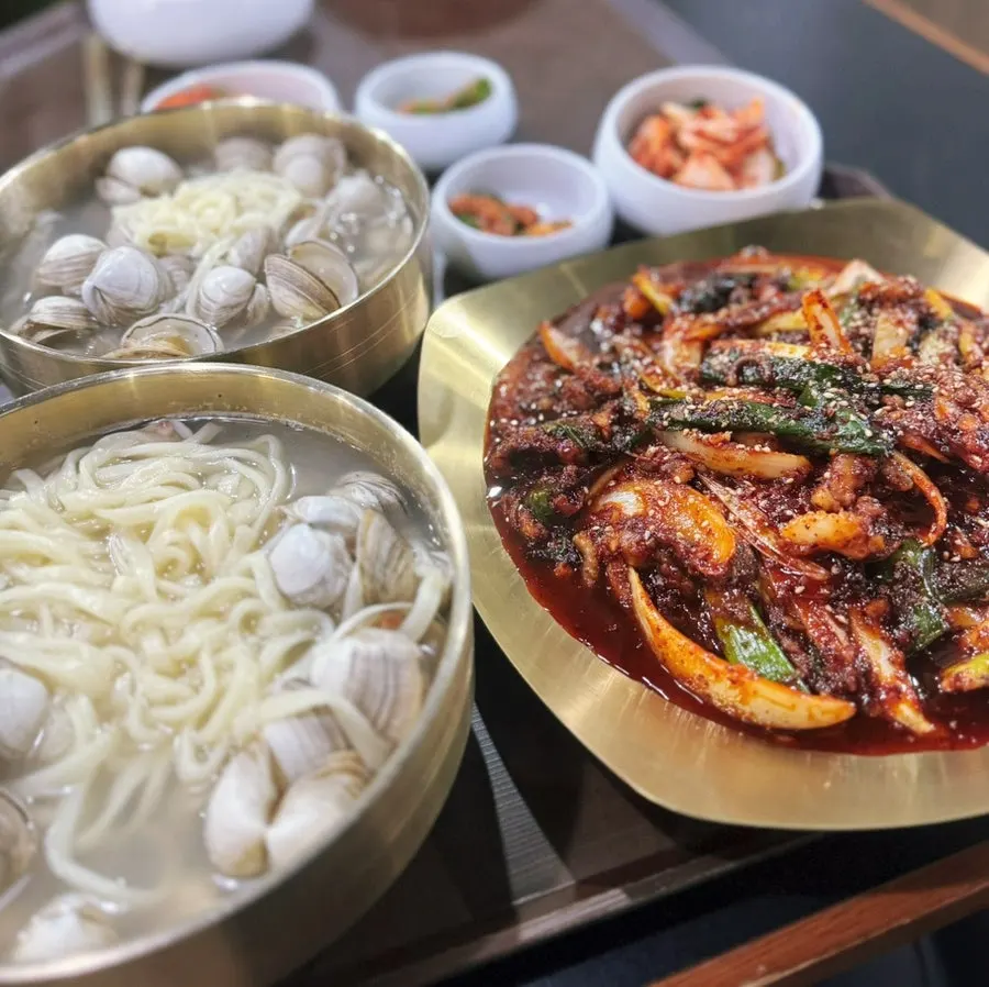 A plate of spicy octopus stir-fry with smoky char