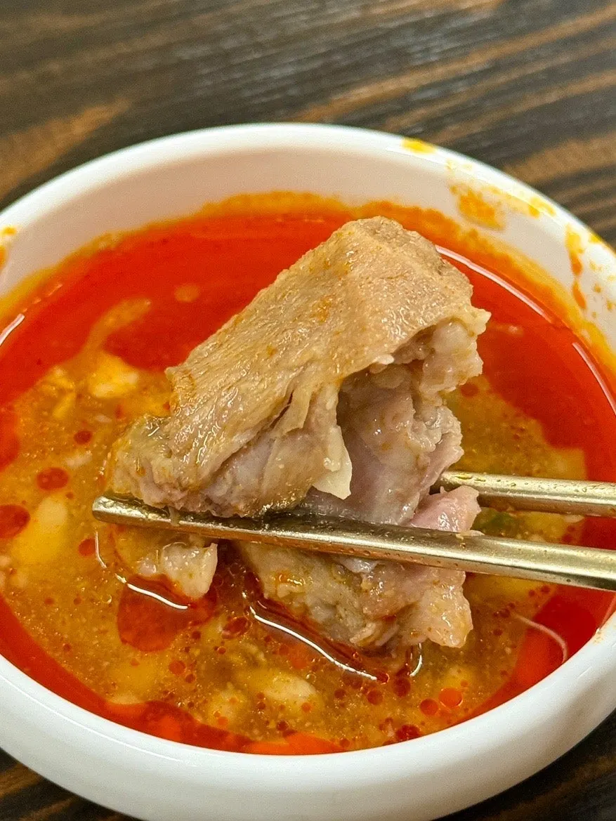 A large chunk of meat inside the bone kalguksu