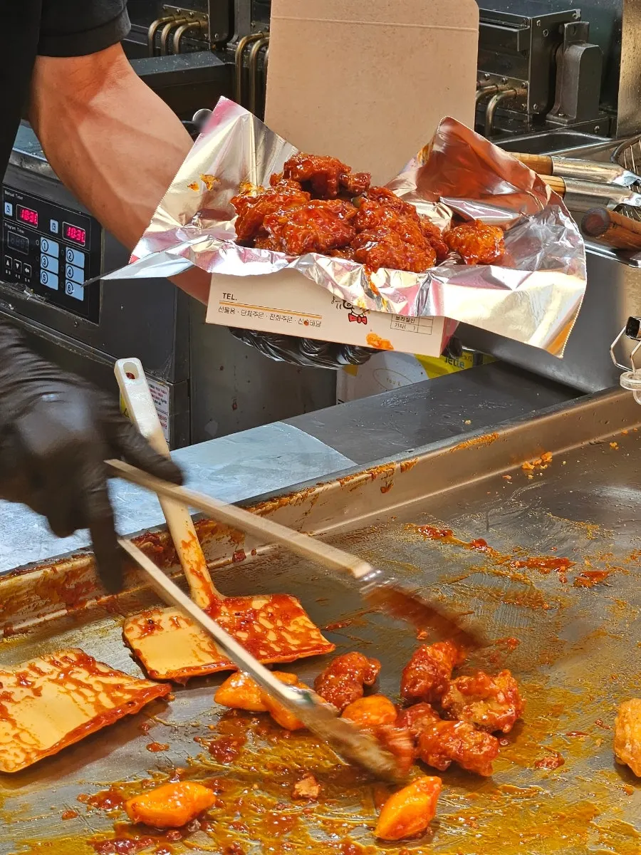 Fried chicken legs on display