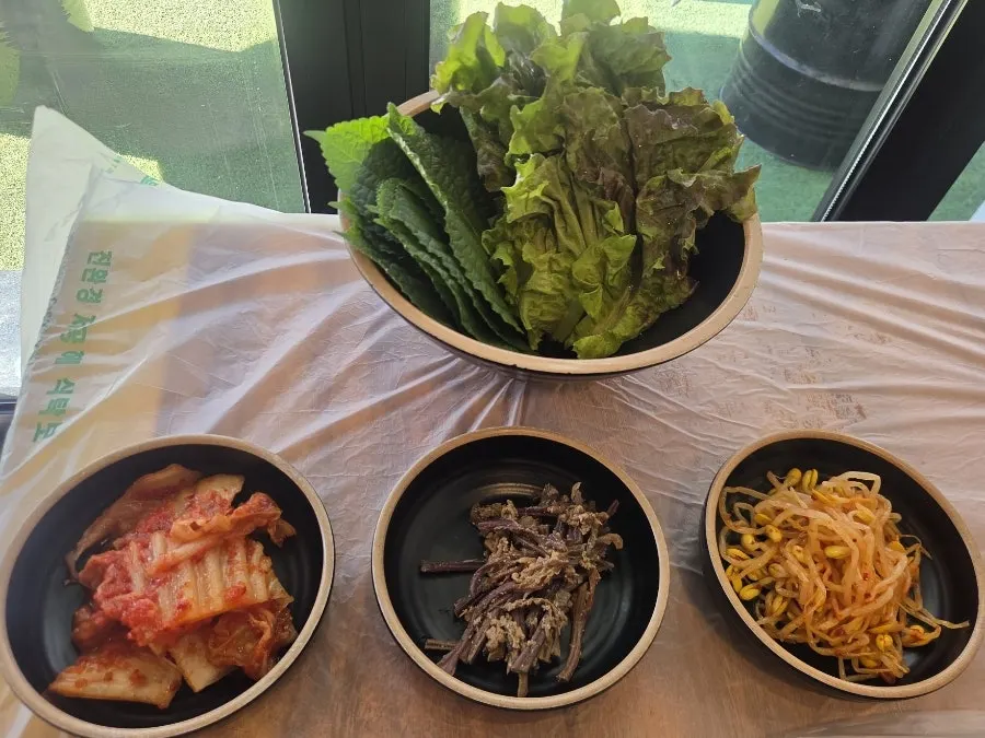 Frozen pork belly table setting and basic side dishes