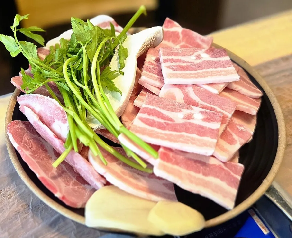 Frozen pork belly and flower pork neck on the grill