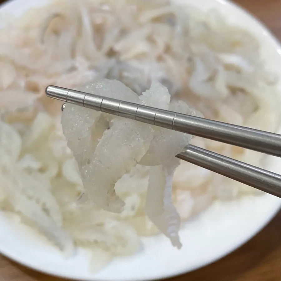 Close-up of thinly sliced yellow flatfish sashimi