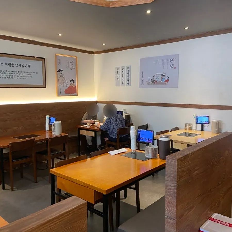 Neatly arranged seating inside the Korean restaurant