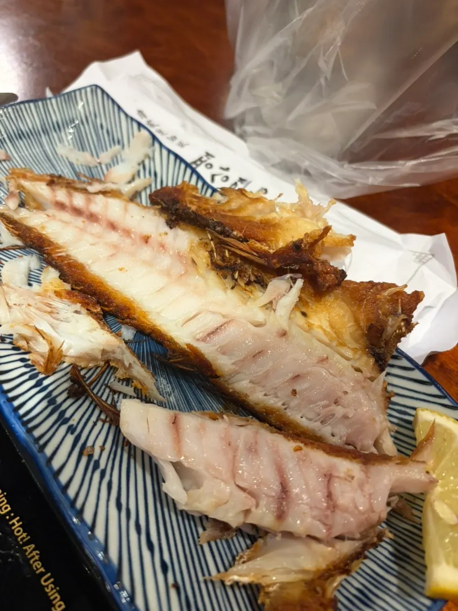 Grilled tilefish with the flesh picked apart