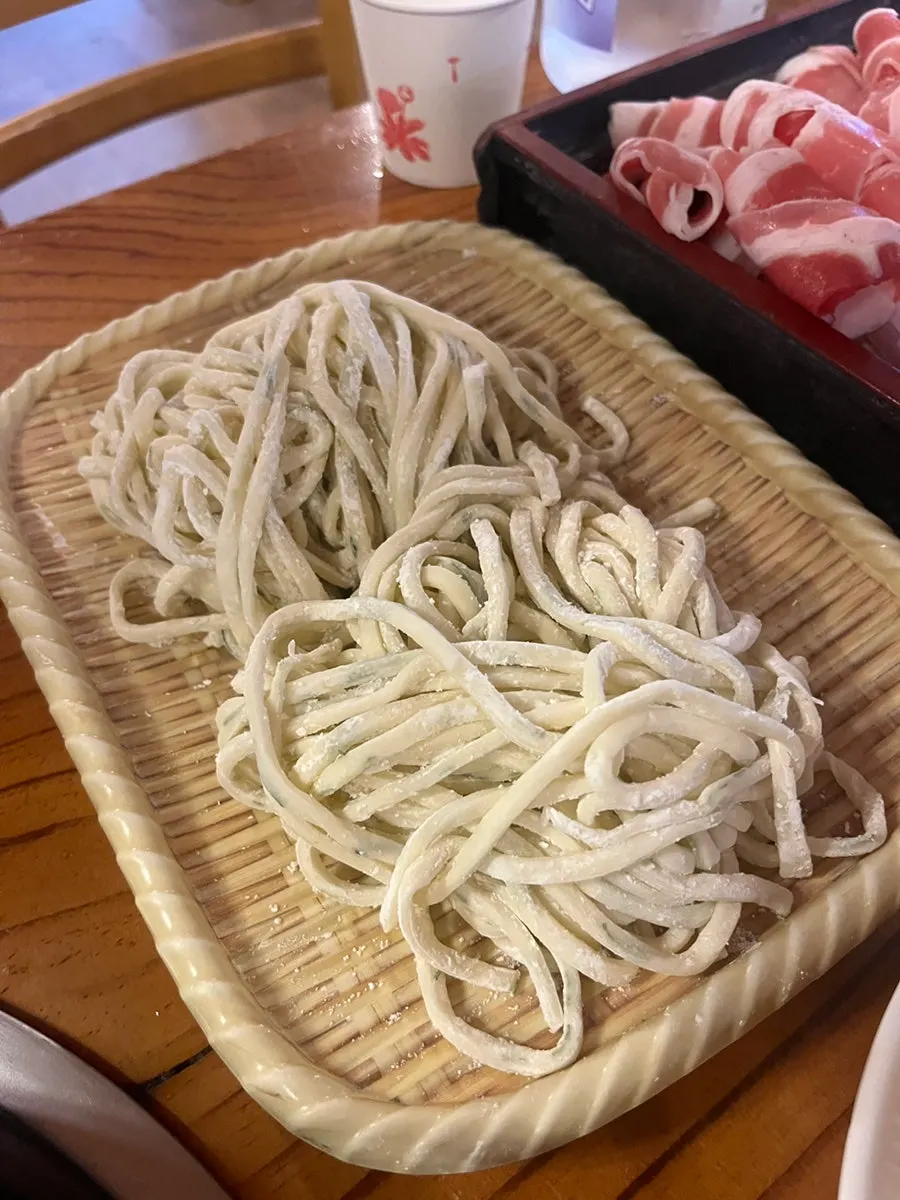 Six freshly steamed meat-mandu dumplings