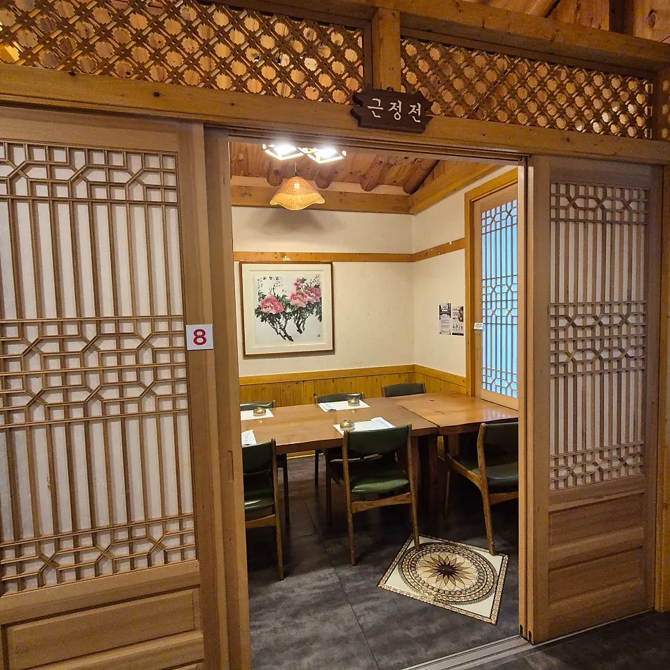 Exterior of Suksudaega's hanok with tiled roof and wood details
