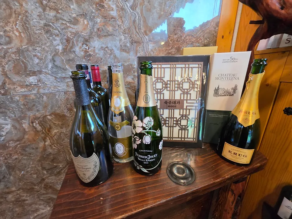 Wine bottles with price tags attached