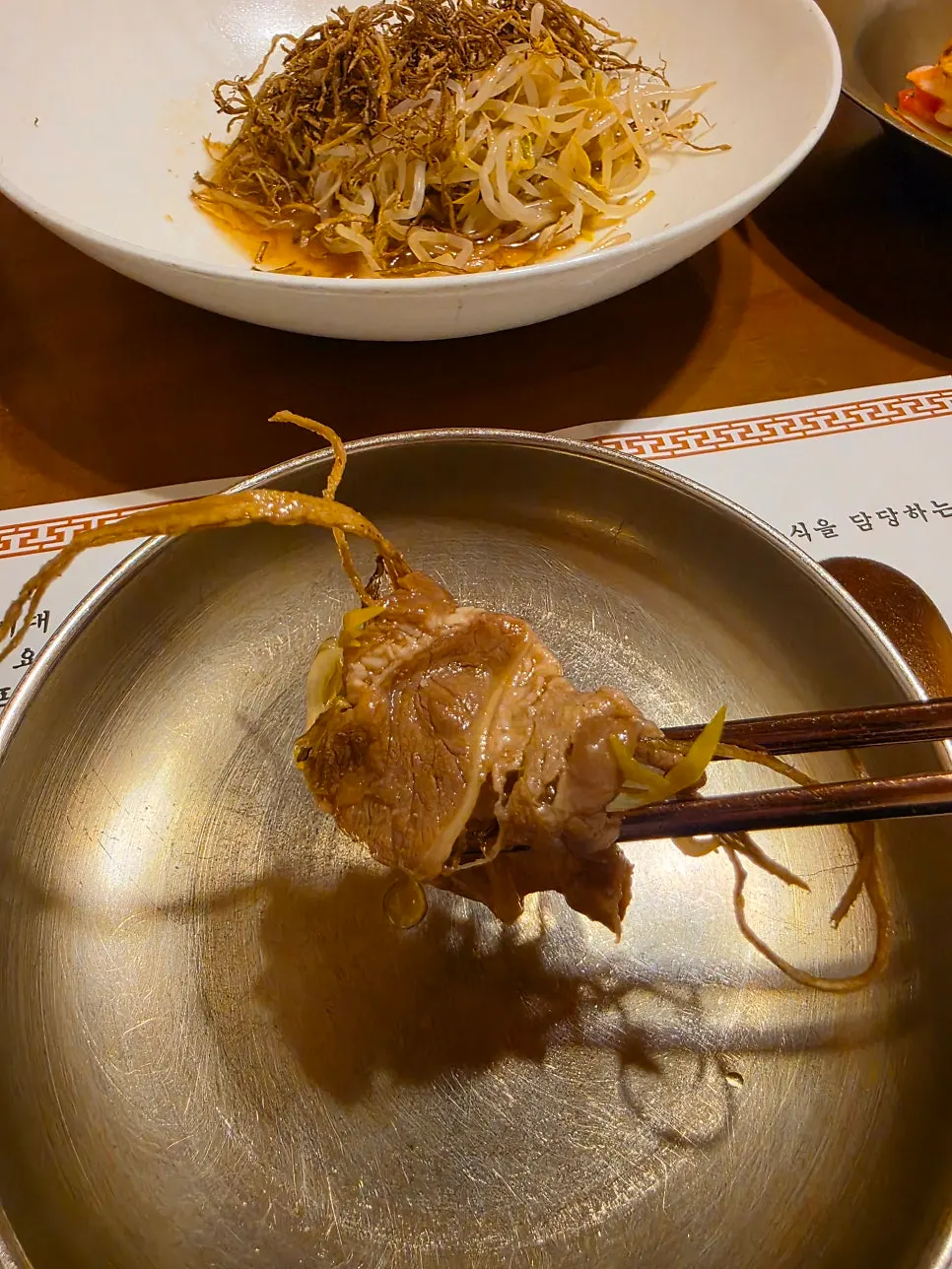 Plate of royal court bulgogi salad and royal court japchae