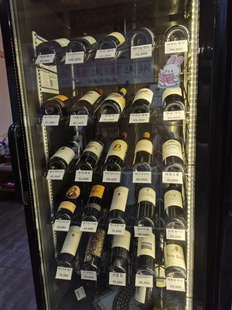 Wine bottles displayed at Suksudaega