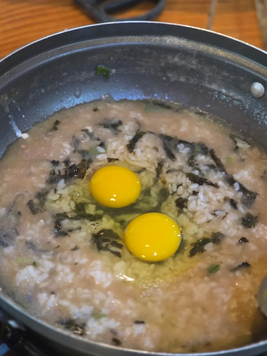 Self-serve egg porridge bubbling away