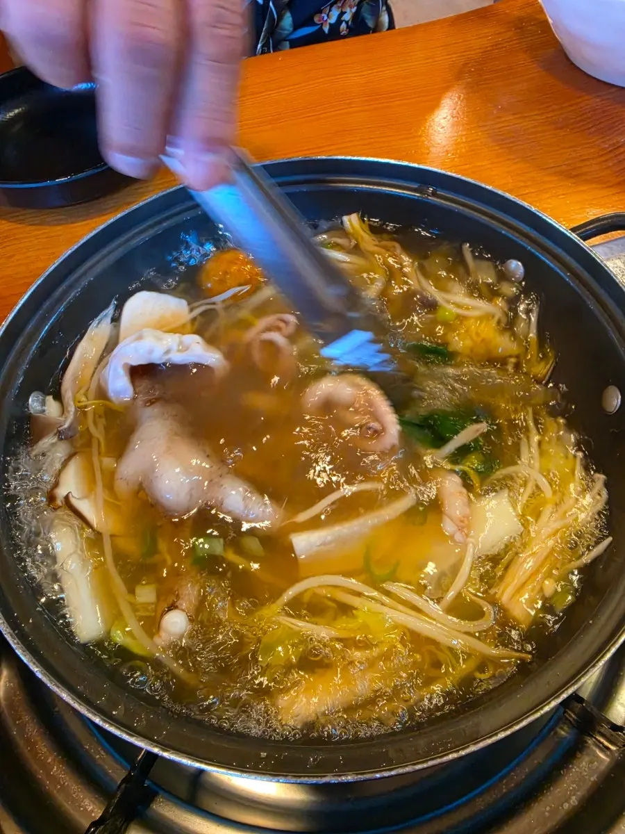 Octopus cut into bite-size pieces in the broth