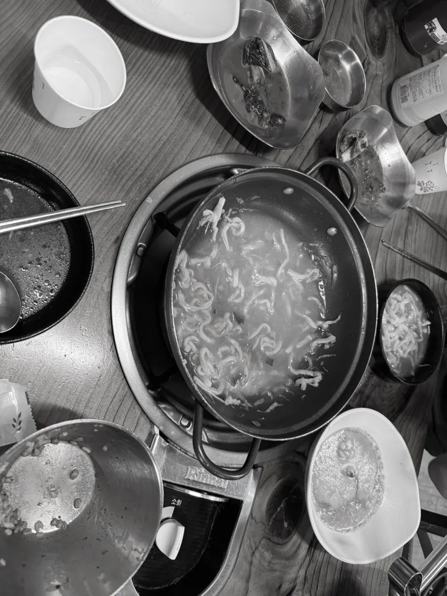 Hot pot finished with house-made chive noodles