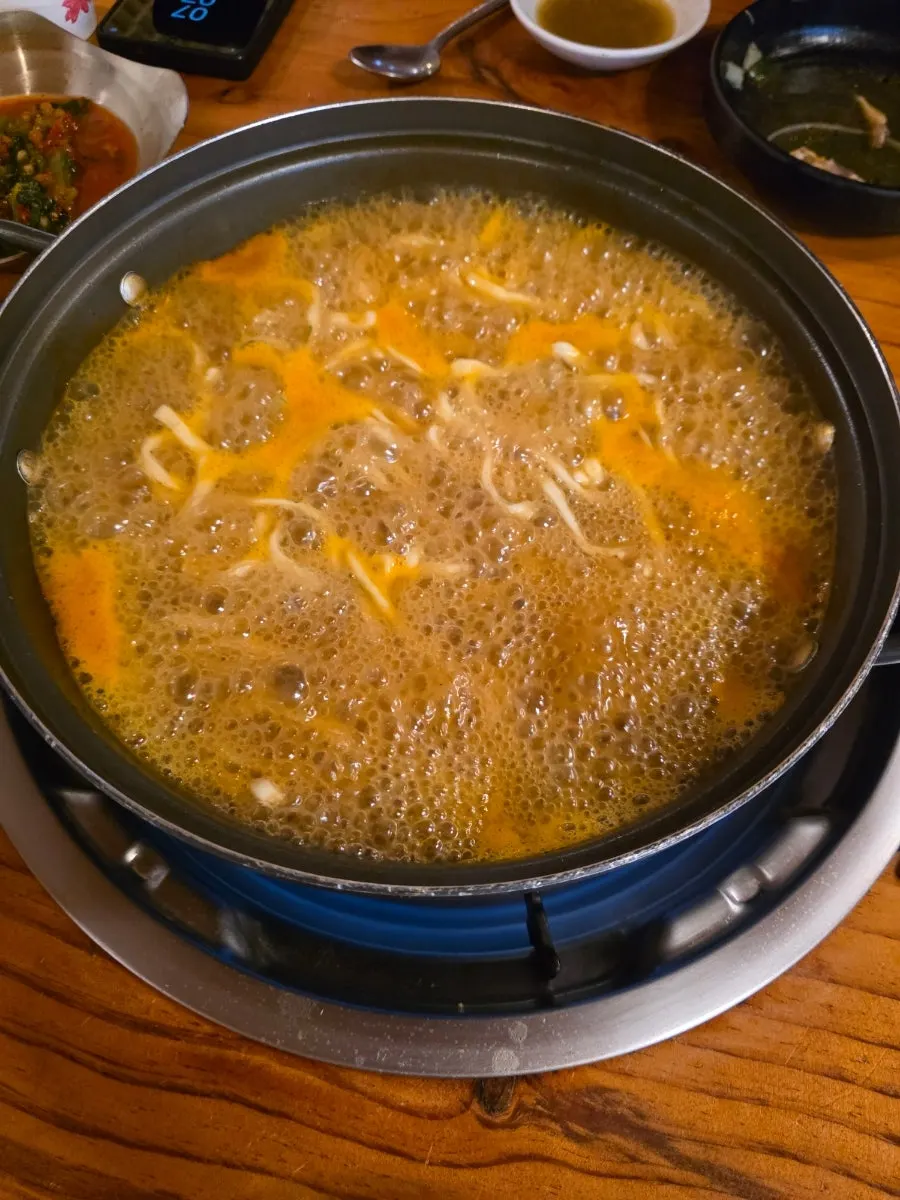 House-made kalguksu noodles with chives mixed in