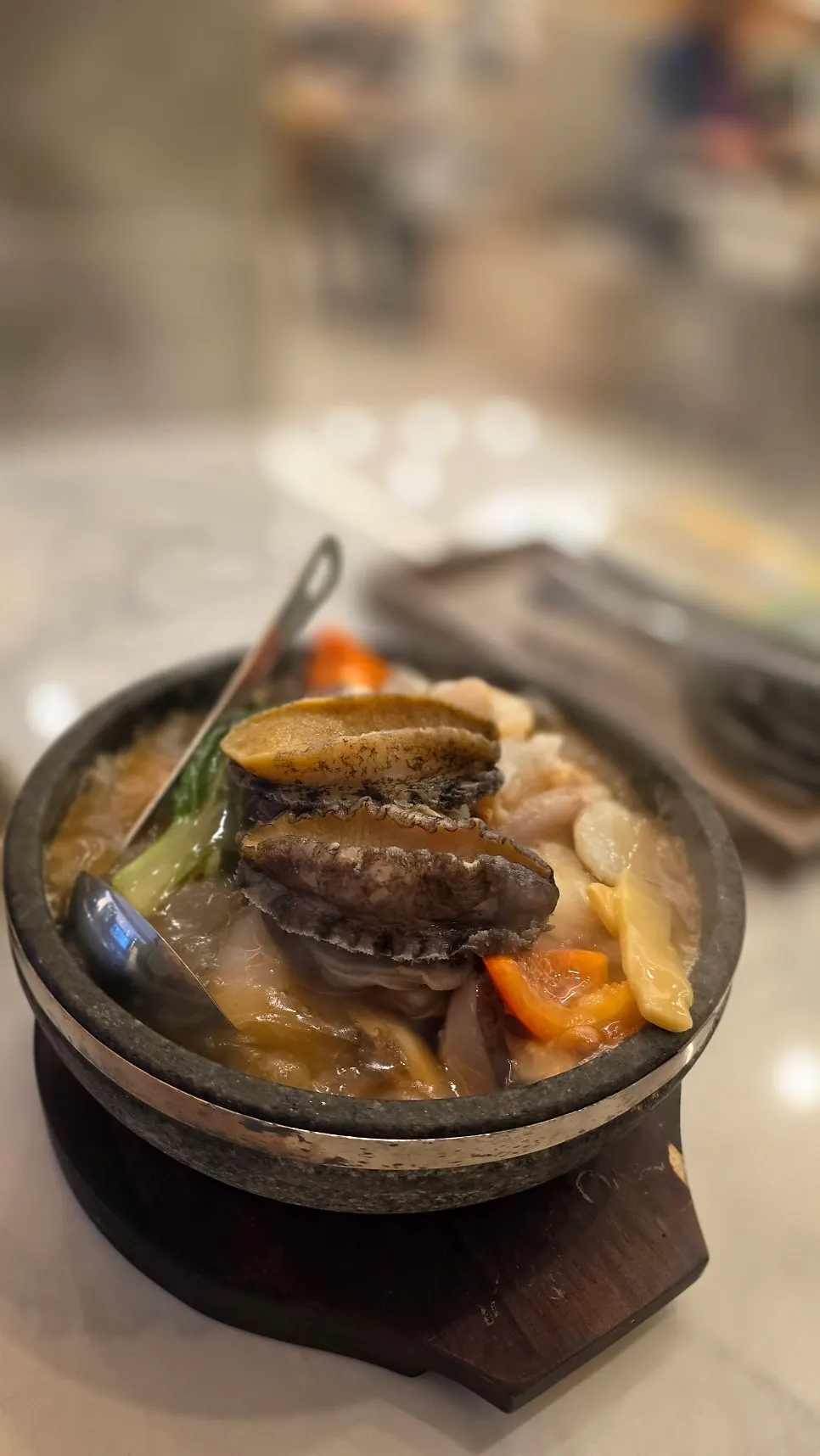 Vertical photo of Hwanggeum Seafood Nurungji-tang's seafood nurungji-tang