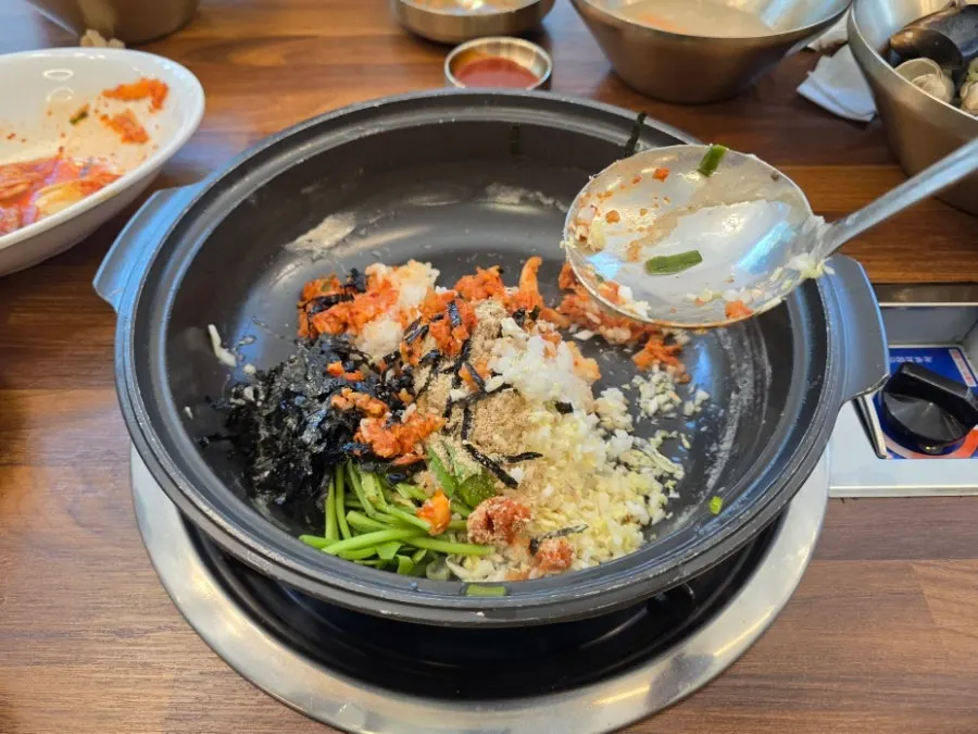 Pot with free fried rice ingredients added in