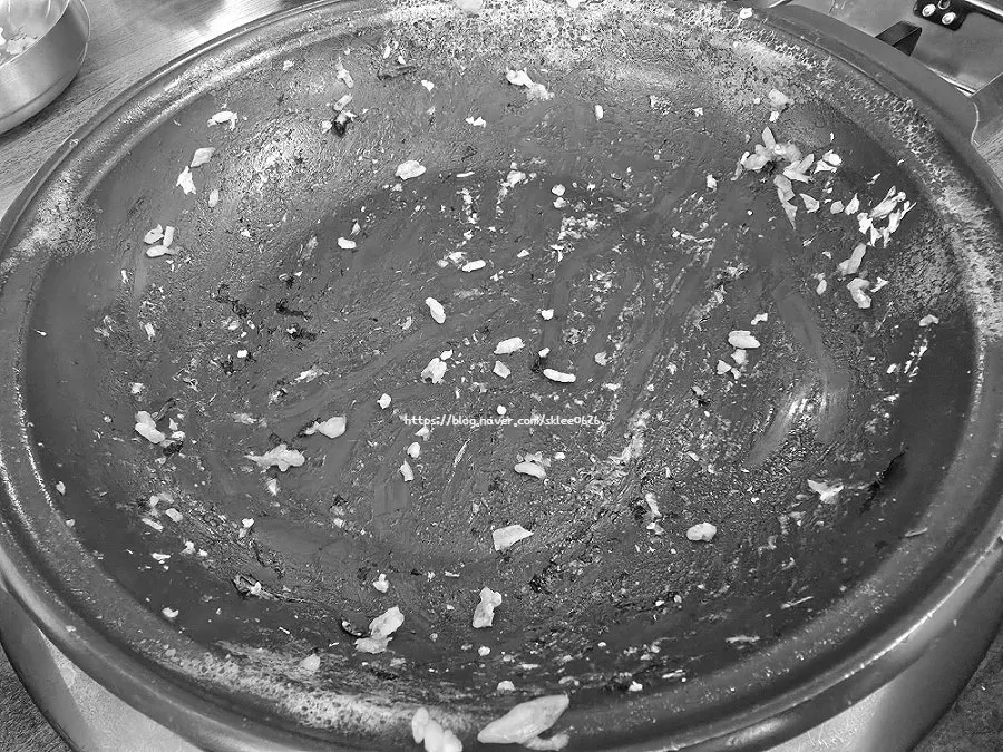A nearly empty pot of fried rice