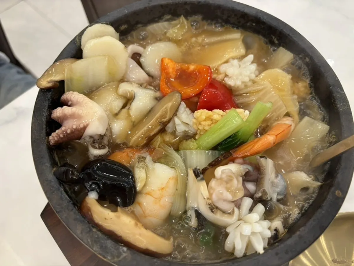 Stone pot seafood nurungji-tang with shrimp and baby octopus