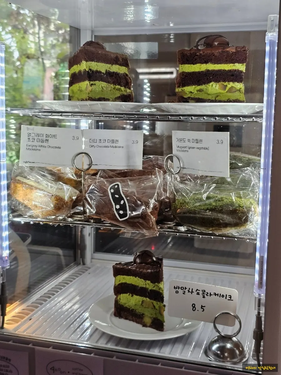 Vertical shot of Cafe Pomun's dessert showcase