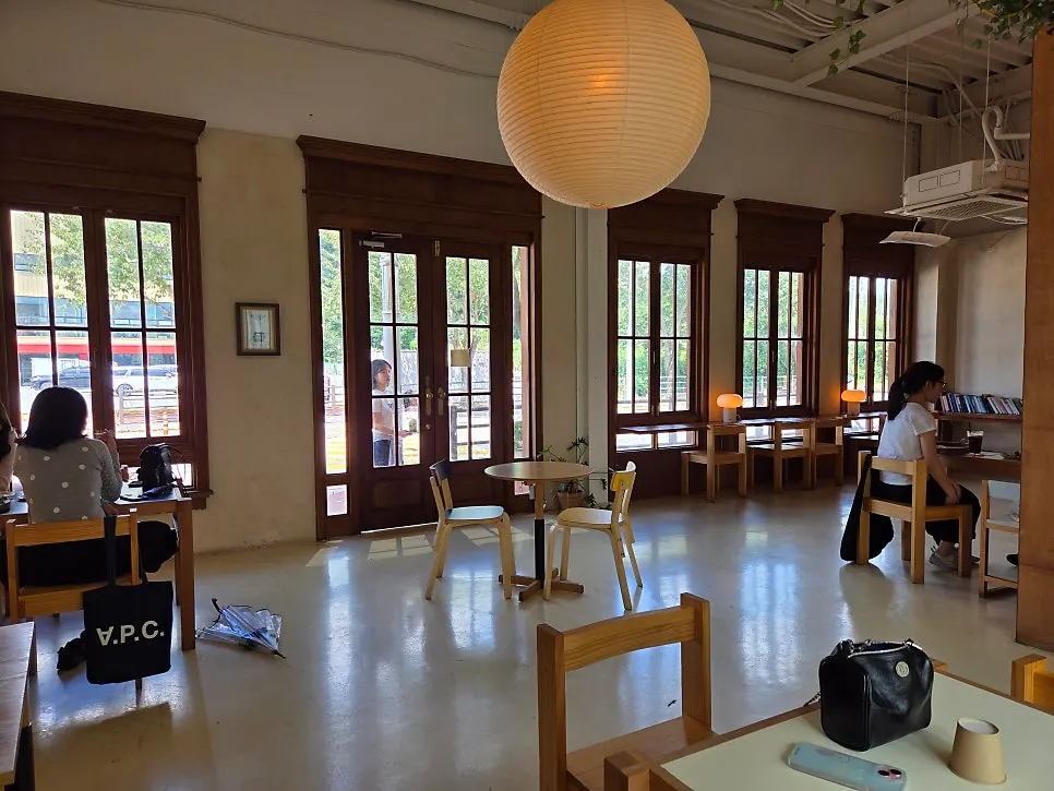 Wood-toned interior of Cafe Pomun's main building