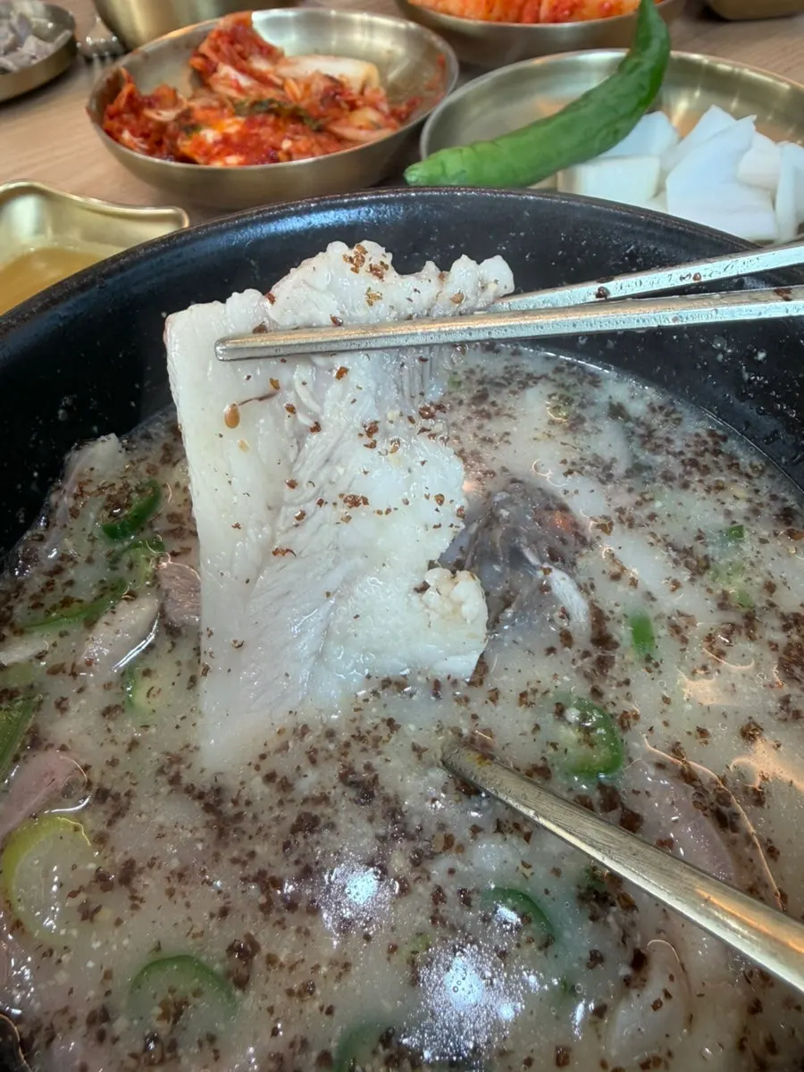 A meal of sundae-guk shared with a child